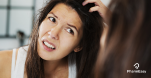 Women scratching hear scalp - Scalp problems in women