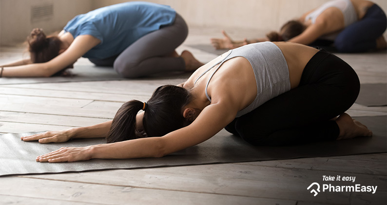 A women practicing yoga